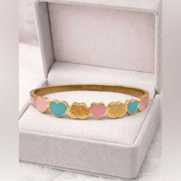 . Jewelry - Elegant Gold tone Bracelet with Pink and Blue Hearts